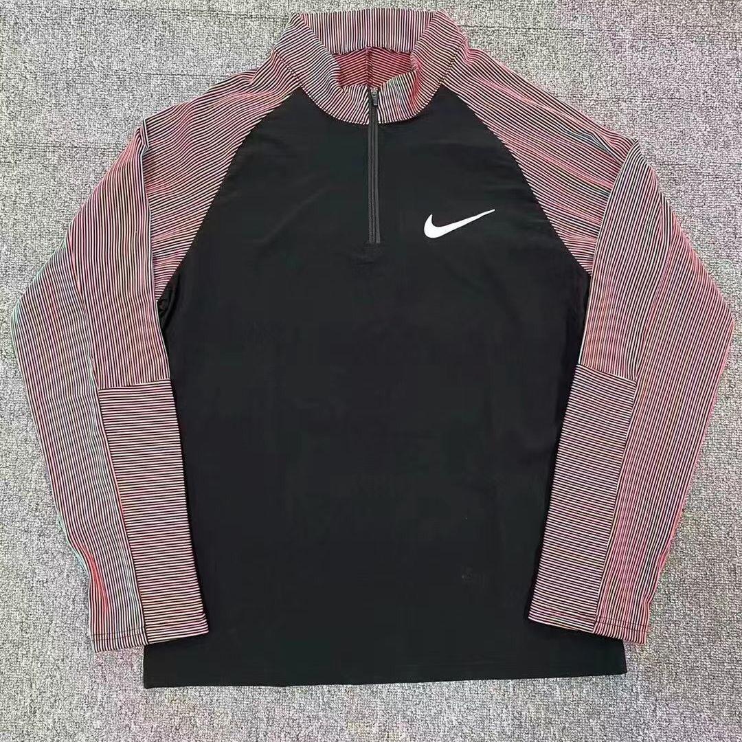 Haut zip running nike